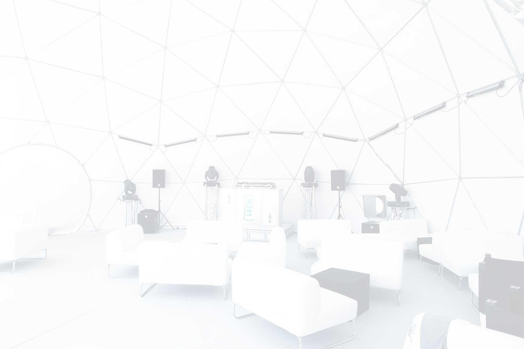interior of dome tent with view at lights and sofas
