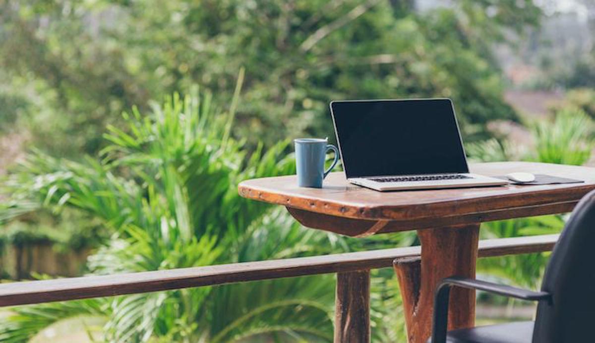 laptop on a wooden table