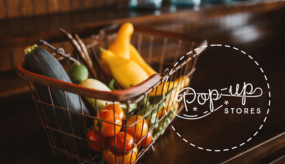 graphic with vegetables in a basket with text "pop-up stores"