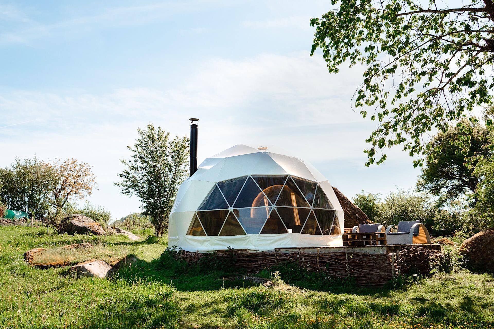 white geodesic dome with stack