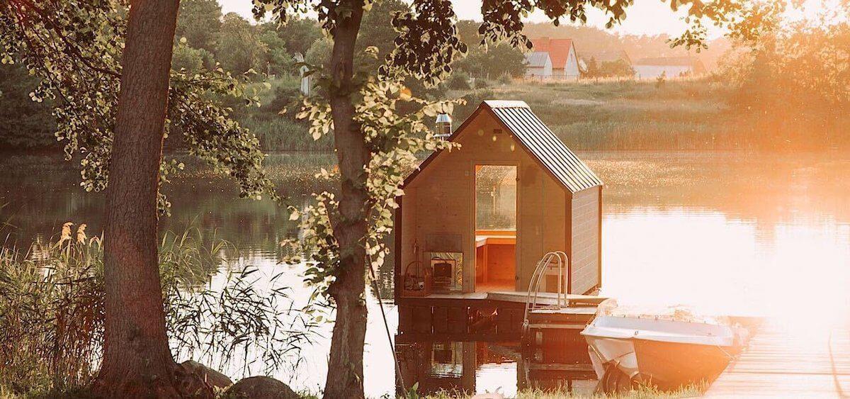 Floating LAGO Sauna panoramic view of the lake in sunset