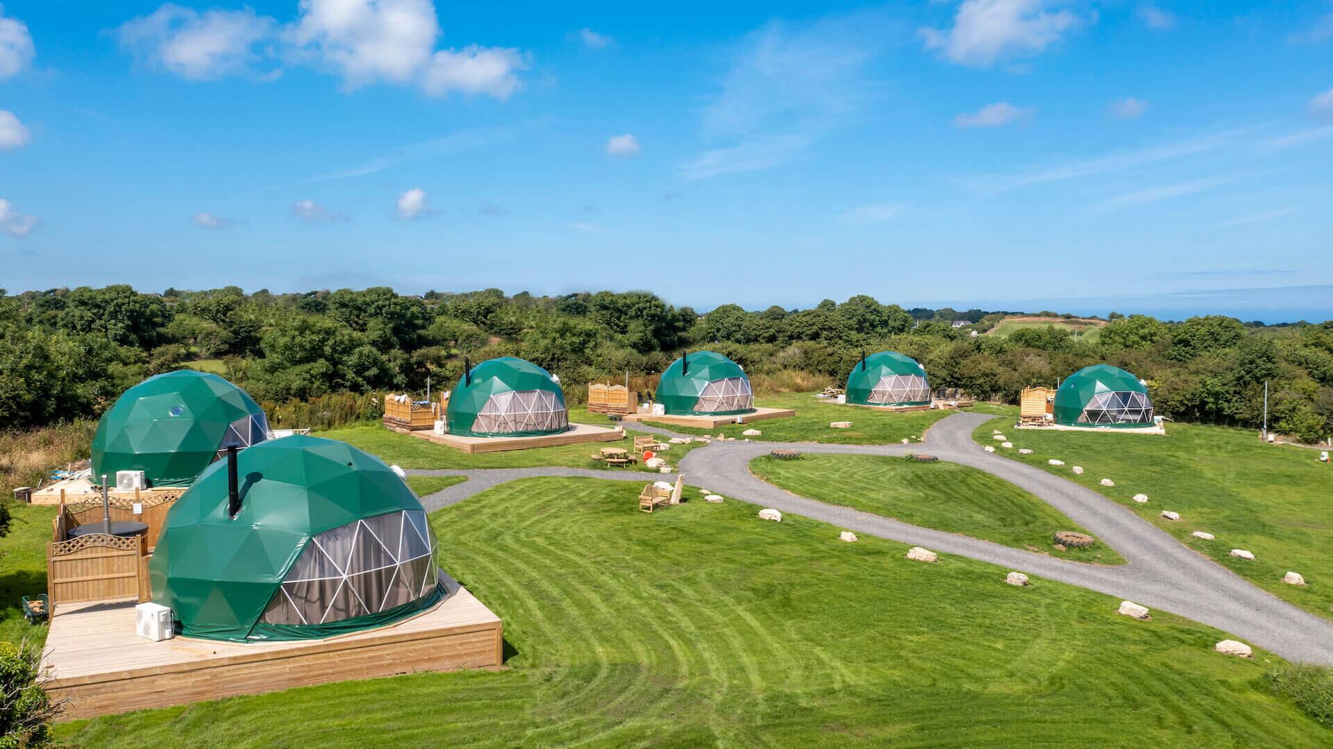 Premium Photo  Transparent bubble tent and woman doing yoga at glamping