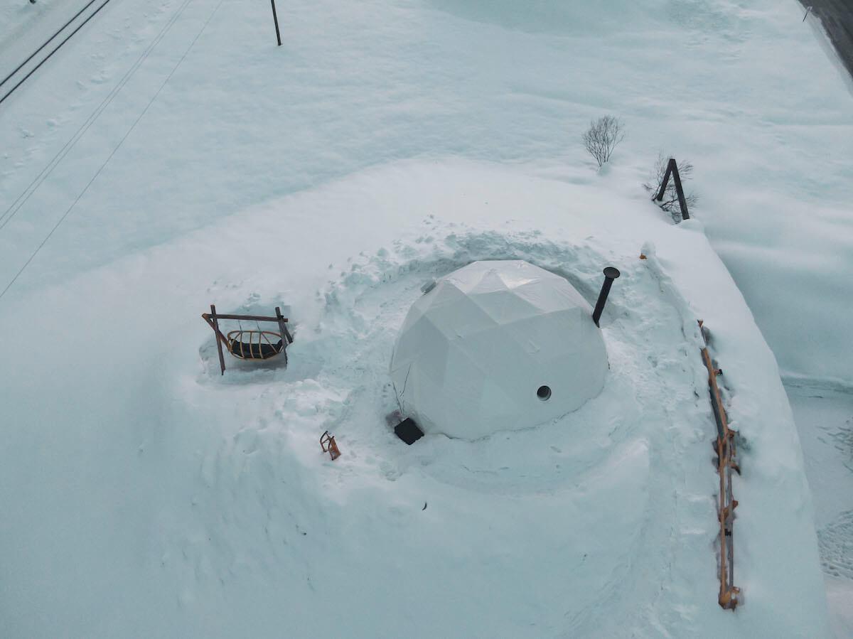 Glamping Dome in heavy snow on the abandoned hangar rooftop