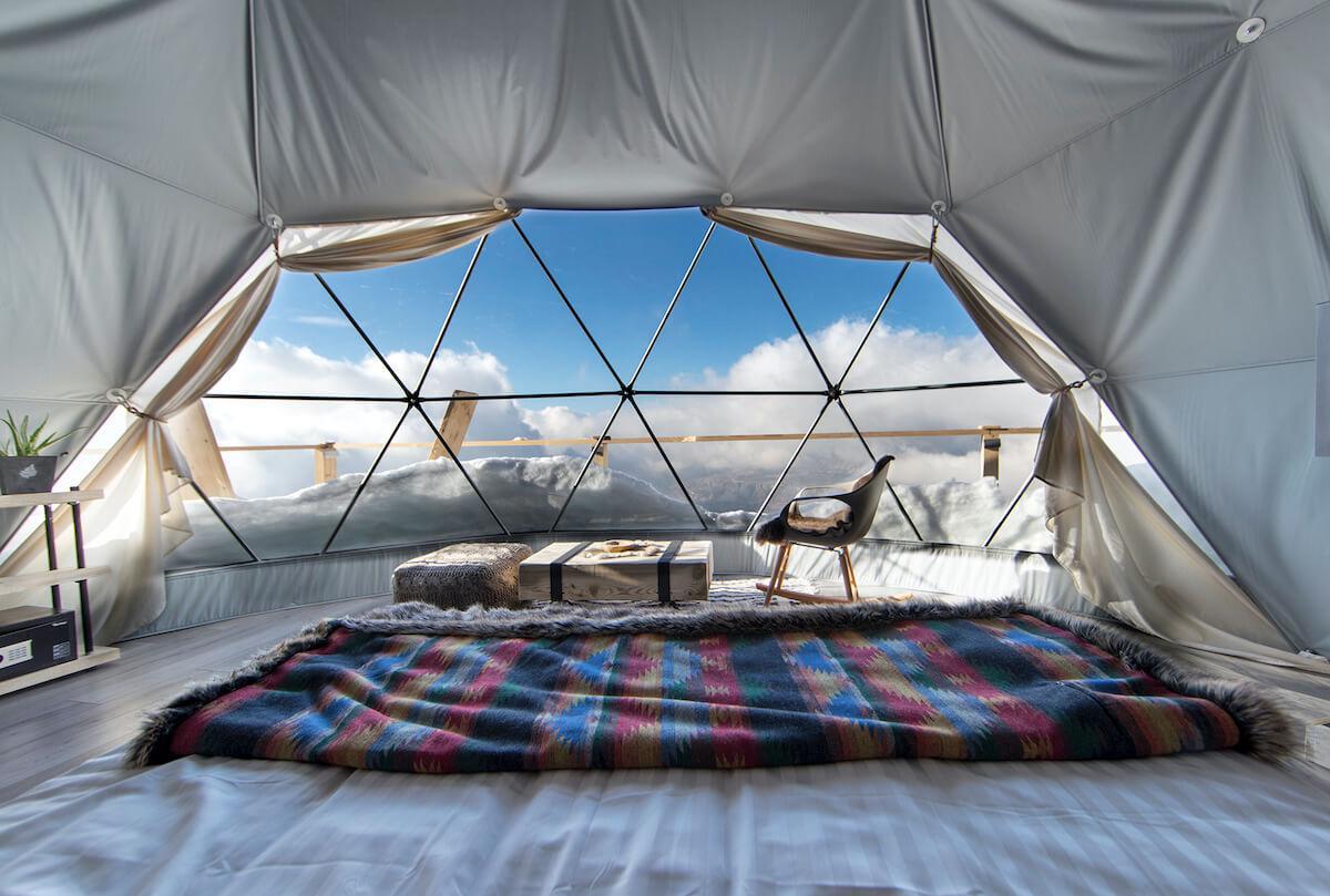 FDomes Glamping Odoms amazing view through panoramic bay window, perspective from the bed