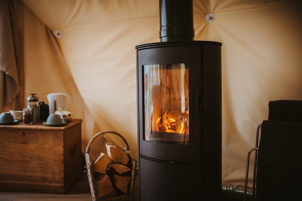 Chimney Kit a wood-burning stove inside the FDome geodesic structure