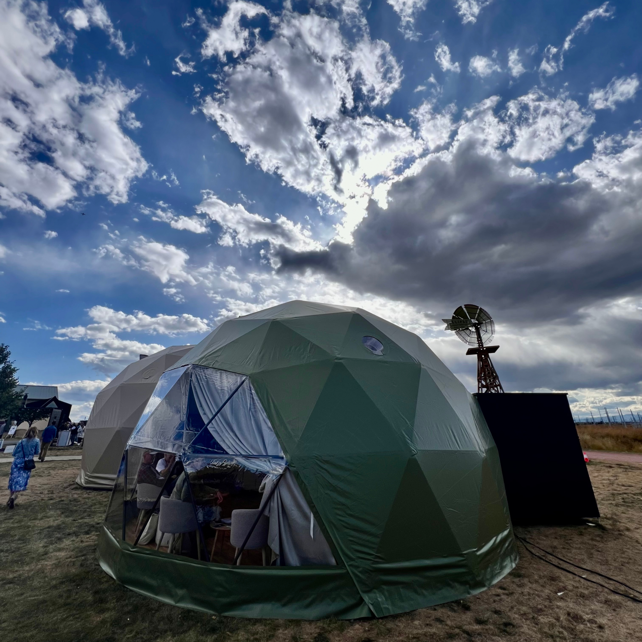 green geodesic glamping dome by FDomes at Glamping Show Americas 2023, Colorado, USA